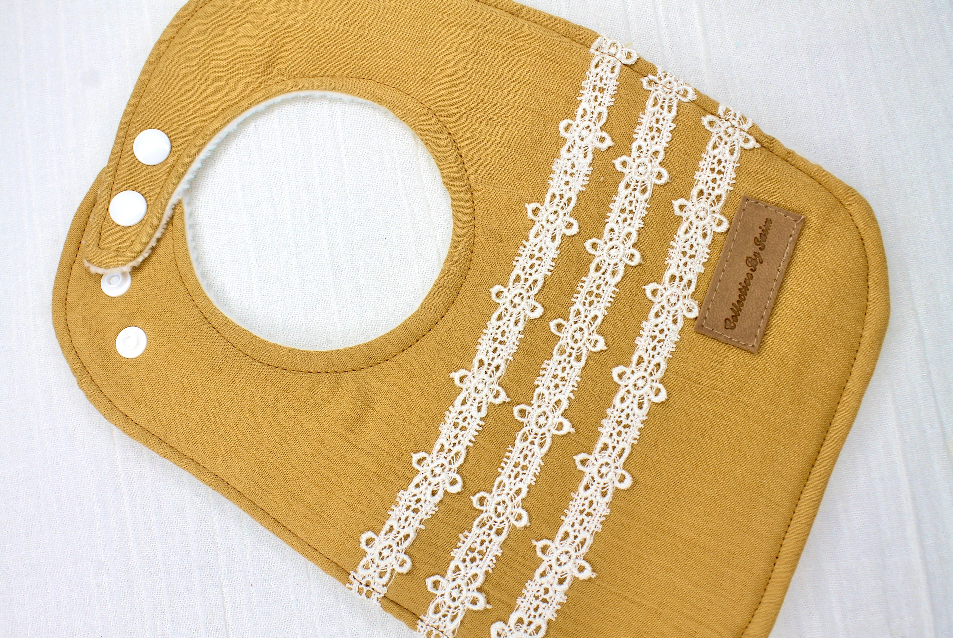 Mustard Double Cloth Daisy Chain Lace Bib with Cotton Backing