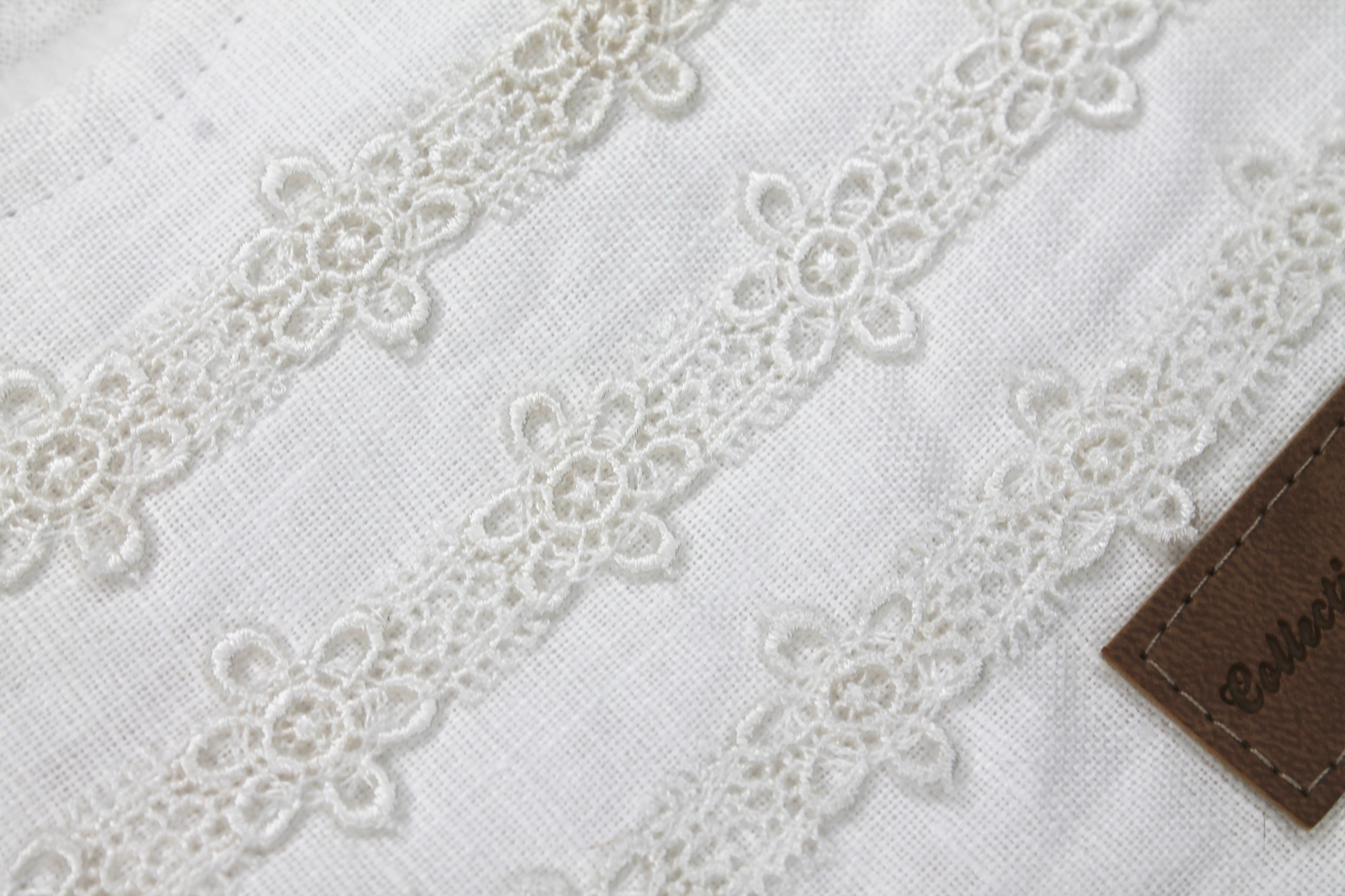 White Linen Daisy Chain Lace Bib with Fleece Backing