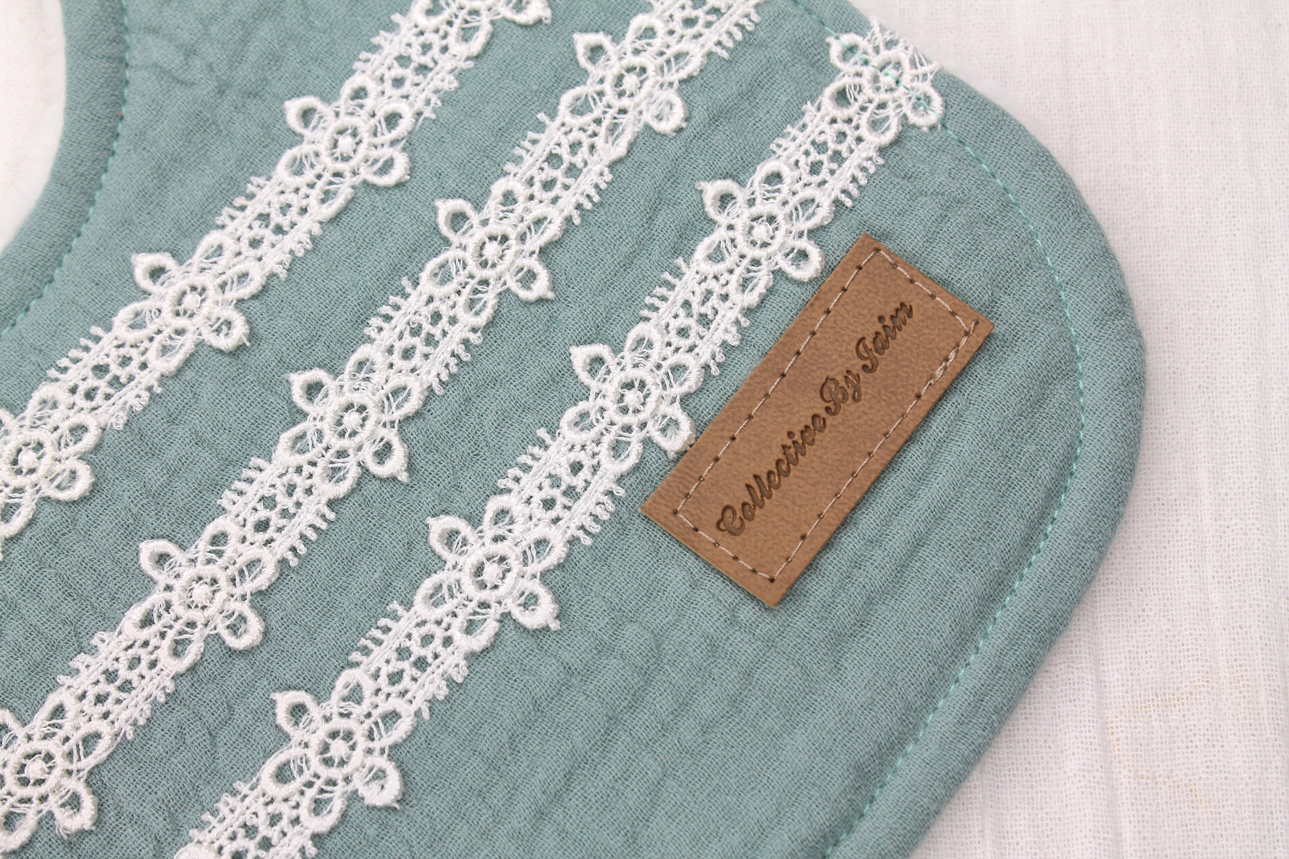Ocean Double Cloth Daisy Chain Lace Bib with Fleece Backing