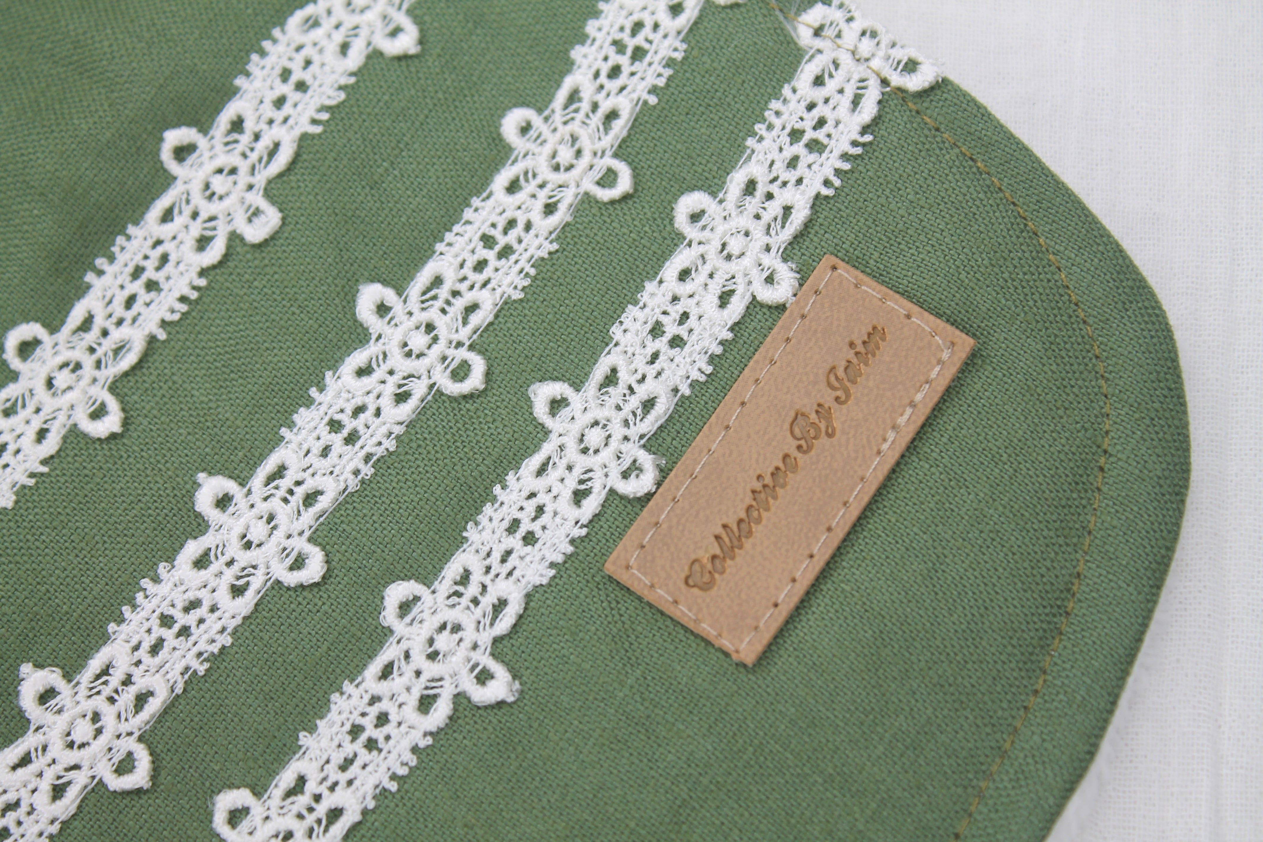 Khaki Linen Daisy Chain Lace Bib with Cotton Backing