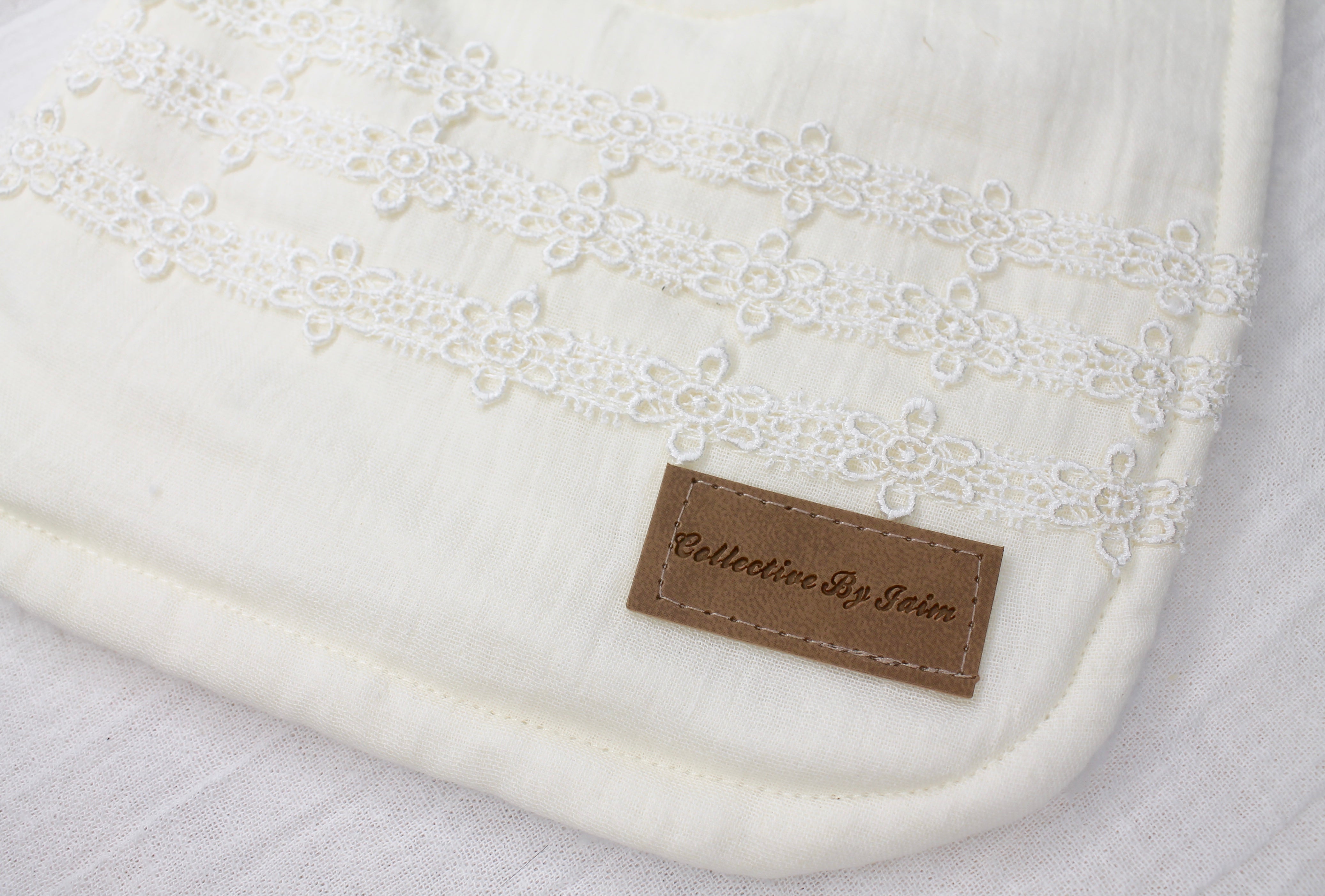 Cream Double Cloth Daisy Chain Lace Bib with Fleece Backing